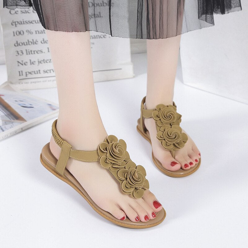 Sandalias de tiras con decoración floral